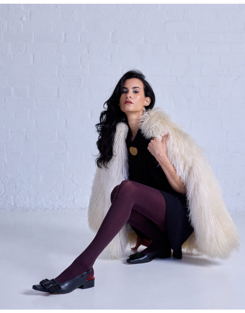 Herringbone Merino Wool Tights by Tightology showing textured herringbone pattern and snug fit on legs.