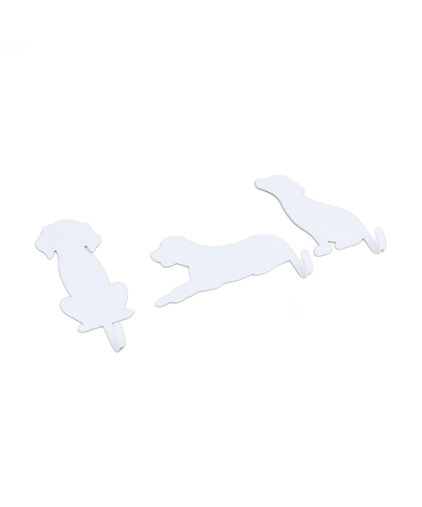 Decorative Suck UK Hooks Dog wall hook featuring a playful dog design for hanging keys or accessories.