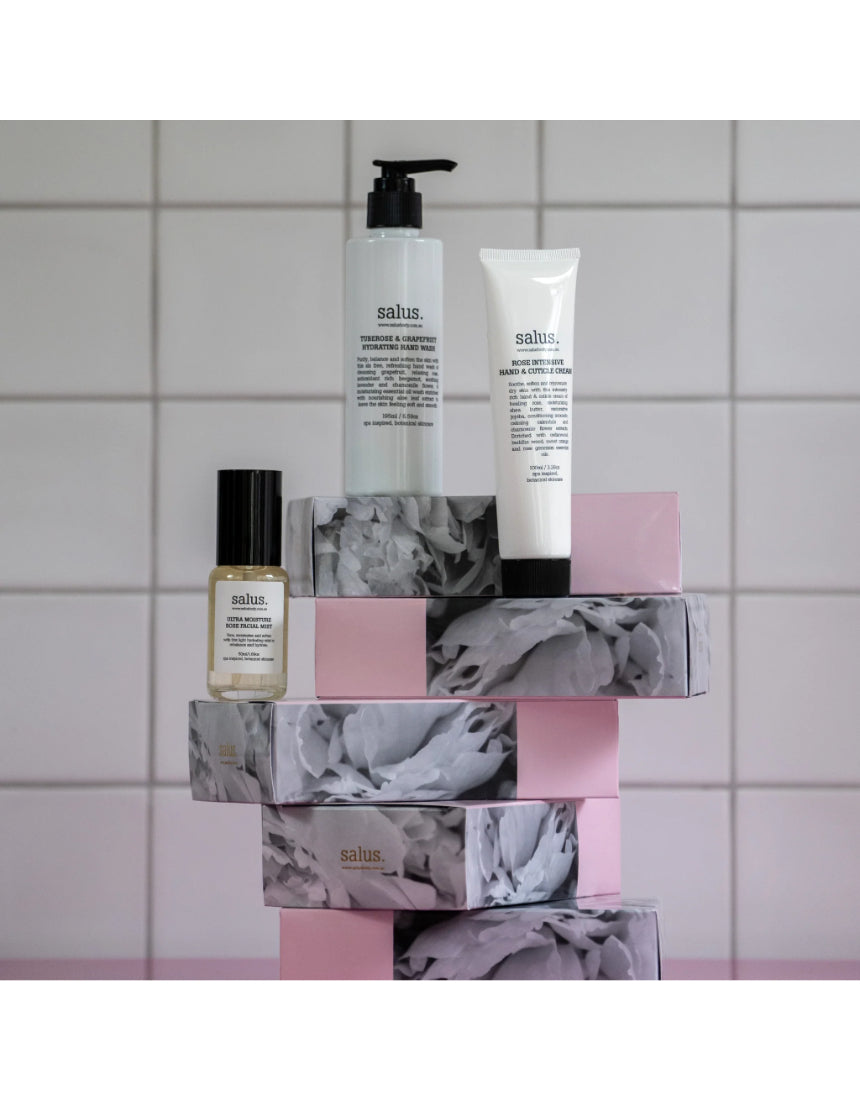 Say It Sister Hydration Trio set featuring three square bottles with vibrant designs, perfect for staying hydrated in style.