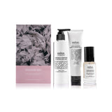 Say It Sister Hydration Trio set with colorful skincare bottles and natural ingredients for nourishing hydration.