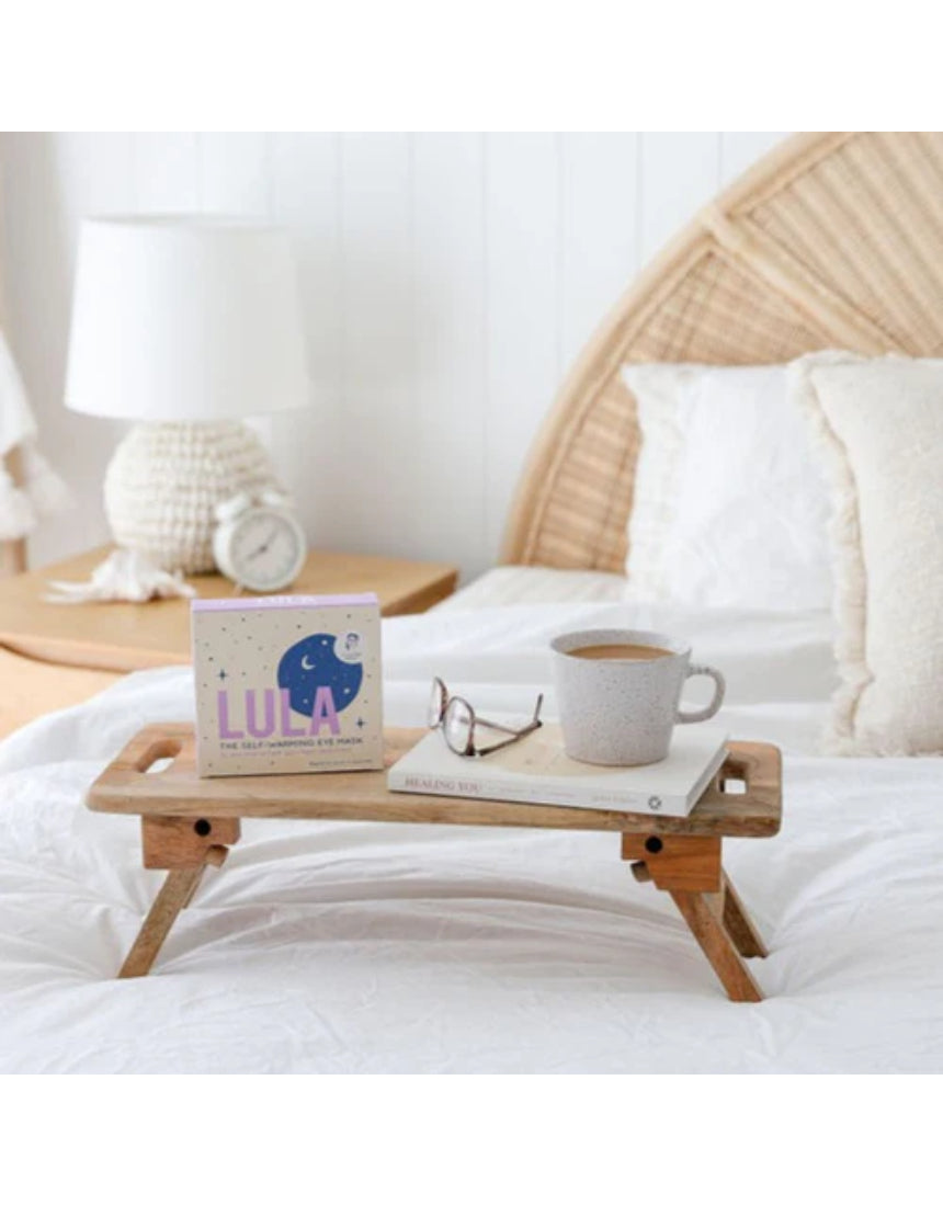 Lula self-warming lavender eye mask, soft fabric with lavender scent, designed for relaxation and soothing sleep.