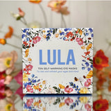 Lula self-warming eye masks in a mixed pack of 10, soft fabric covers for soothing eye relaxation and comfort.