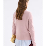 Elk Nevis Merino Sweater in blush pink, soft knit fabric, showcasing a cozy, stylish design suitable for casual wear.