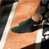Green Klue Glitter Lurex Socks featuring shiny, textured fabric with a snug fit and stylish sparkle detail.