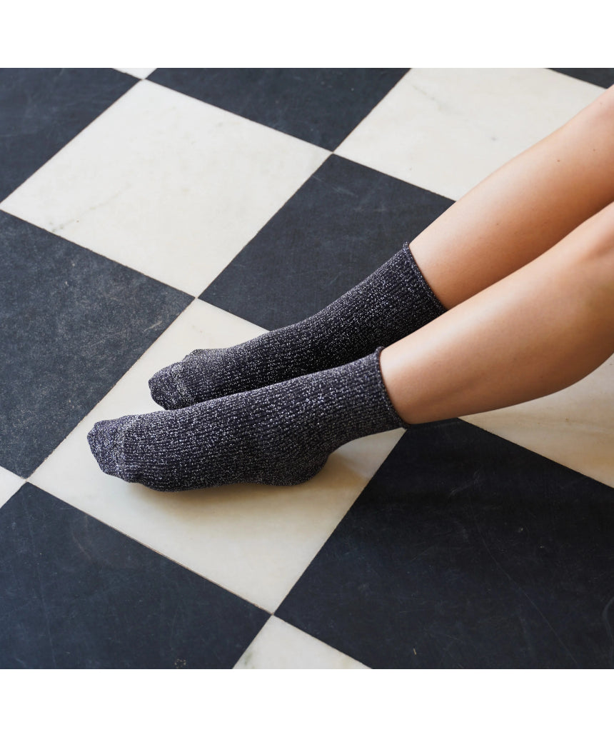 Grey glitter Lurex socks by Klue with a shiny, textured sock design, showcasing a stylish and comfortable fit.