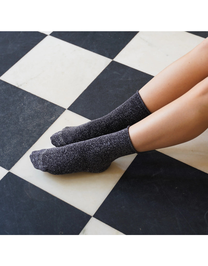 Grey glitter Lurex socks by Klue with a shiny, textured sock design, showcasing a stylish and comfortable fit.