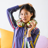Kip & Co Cottage Garden silk travel pillow with floral pattern and soft fabric, designed for comfortable travel rest.