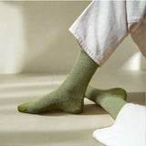 Olive green Klue Glitter Lurex Socks with shimmering yarn and ribbed cuffs, stylish and comfortable for everyday wear.