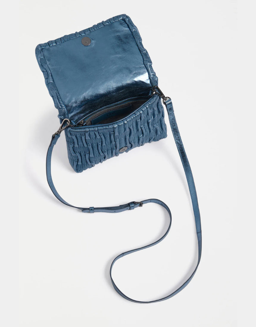 Navy Elk Liska crossbody bag with adjustable strap, featuring a sleek design and compact size, perfect for everyday use.