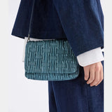 Elk Liska crossbody bag in navy, showcasing a sleek design with adjustable strap and minimalist style.