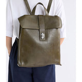 ELK The Label Hyddan backpack in dark olive color with adjustable straps and zippered main compartment.