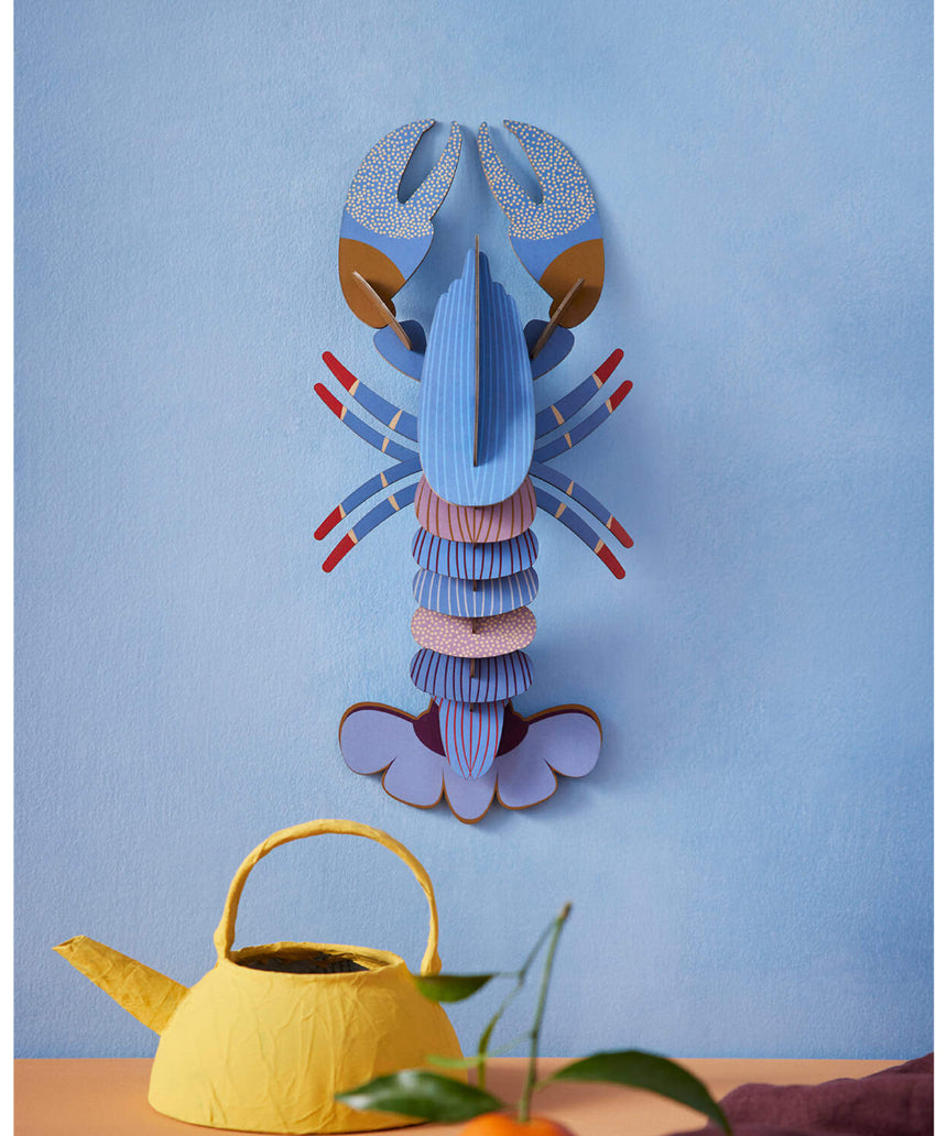 Vertical A4 wall art print by Studio Roof featuring a lavender-colored lobster, perfect for modern marine-inspired decor.