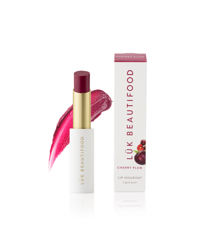 Luk Beautifood Lip Nourish lipstick in Cherry Plum, featuring a rich, natural lipstick tube with the product name visible.