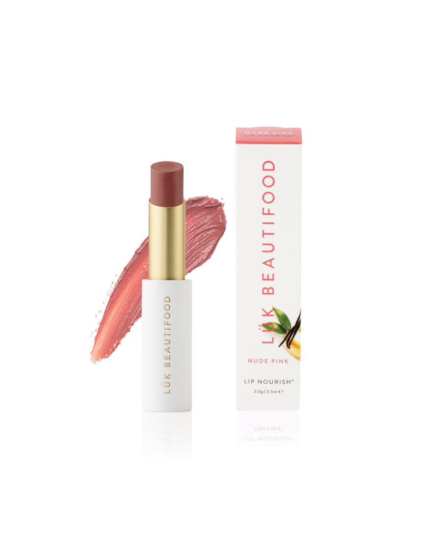 Luk Beautifood Lip Nourish lipstick in Nude Pink, showing the sleek tube and the soft pink shade inside.