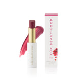 Luk Beautifood Lip Nourish lipstick in Rosé shade, showcasing a creamy, natural-colored lip product with sleek packaging.