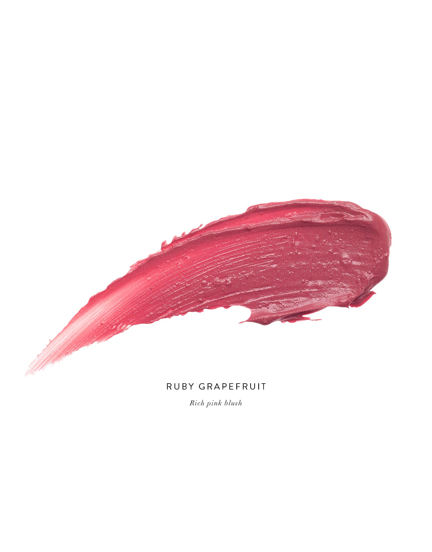 Luk Beautifood Lip Nourish lipstick in Ruby Grapefruit with vibrant orange-red shade and sleek packaging.