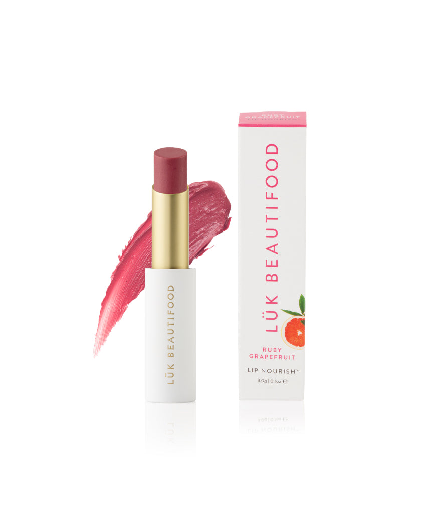 Luk Beautifood Lip Nourish lipstick in Ruby Grapefruit with vibrant orange-red shade and sleek packaging.