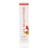 Lük Beautifood Cranberry Citrus Lip Nourish lipstick in a sleek tube, featuring vibrant cranberry and citrus packaging.