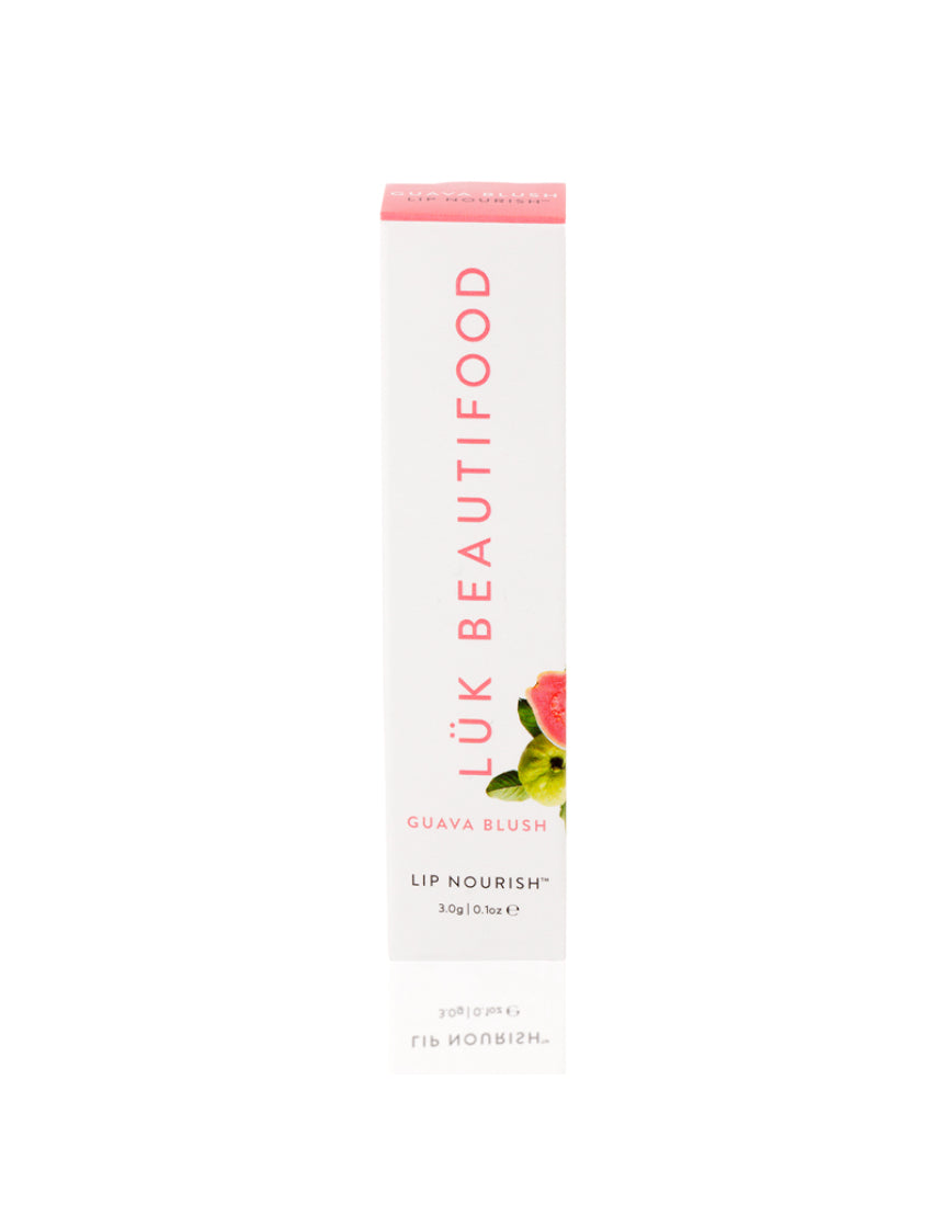 Lük Beautifood Lip Nourish lipstick in Guava Blush, showing the sleek packaging and vibrant pink shade.