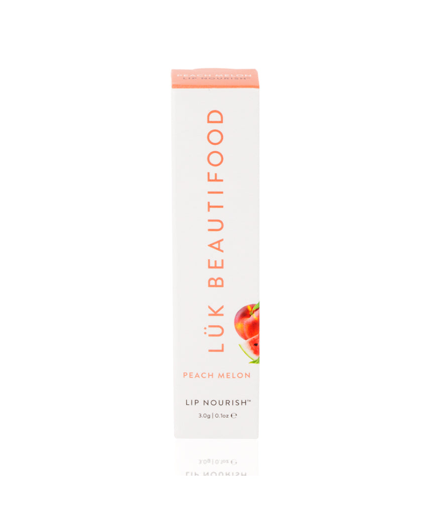 Luk Beautifood Lip Nourish lipstick in Peach Melon, showing a natural peach-orange shade in a sleek lipstick tube.