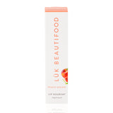 Luk Beautifood Lip Nourish lipstick in Peach Melon, showing a natural peach-orange shade in a sleek lipstick tube.