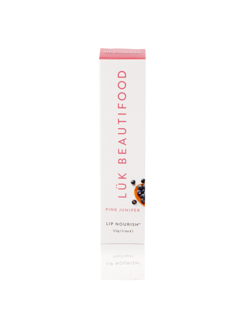 Luk Beautifood Lip Nourish lipstick in Pink Juniper, showing the natural pink shade in the sleek lipstick tube.