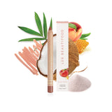 Luk Beautifood Natural Lipstick Crayon in Honey Peach with its packaging and ingredients list visible.