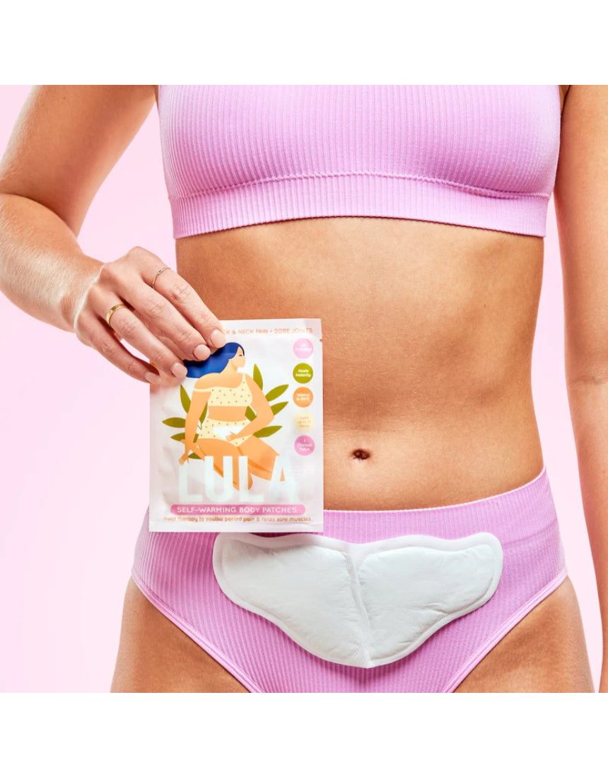 Lula self-warming body heat patch in packaging, designed for soothing warmth and pain relief on the skin.