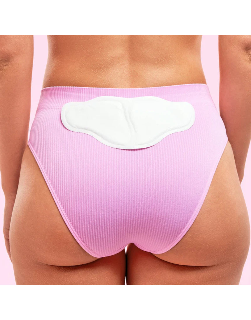 Lula self-warming heat patch designed for soothing body pain, shown in a close-up image with the patch ready to use.