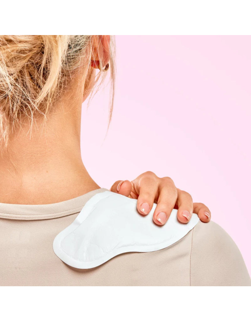 Lula self-warming body patch heat patch shown on skin, designed to provide soothing warmth and pain relief.