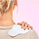 Lula self-warming body patch heat patch shown on skin, designed to provide soothing warmth and pain relief.