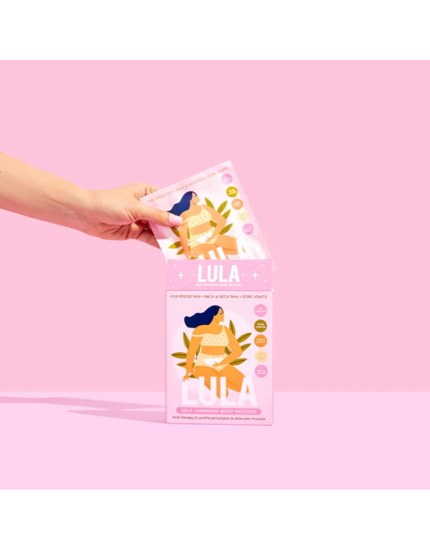Lula self-warming body heat patch applied to the back, designed to provide soothing warmth and relief.