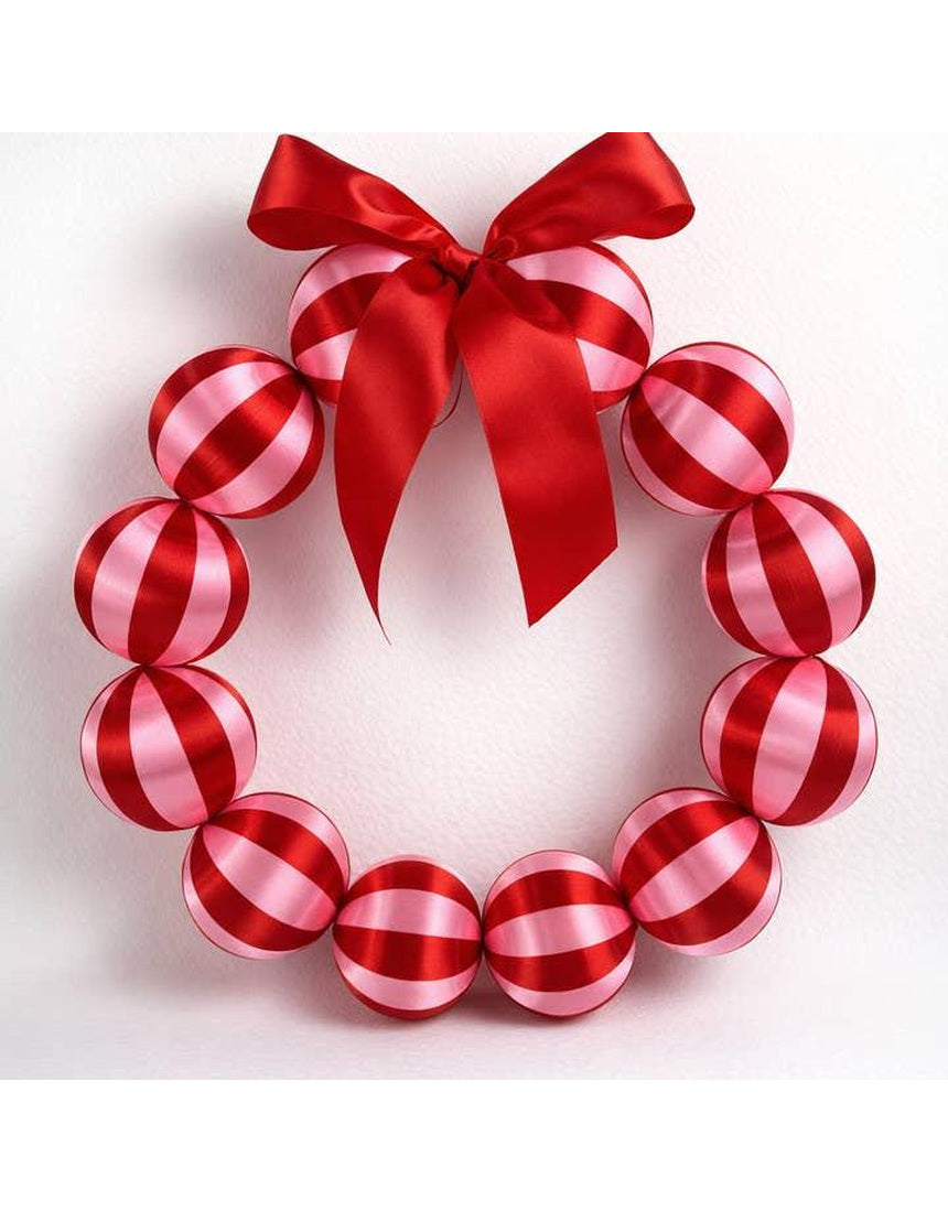 Little Fish Co silk ball Christmas wreath in red and pink with decorative silk balls and festive holiday accents.