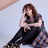 Black Luxe Merino Wool Tights by Tightology, showcasing their sleek fit and soft, high-quality wool fabric.
