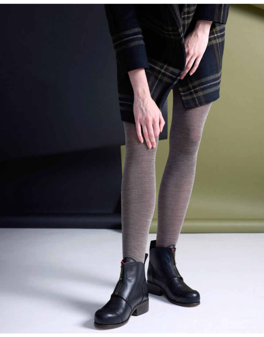 Fawn-colored Luxe Merino Wool Tights by Tightology displayed on a model, showing the smooth, snug fit and fine wool texture.