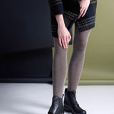 Fawn-colored Luxe Merino Wool Tights by Tightology displayed on a model, showing the smooth, snug fit and fine wool texture.