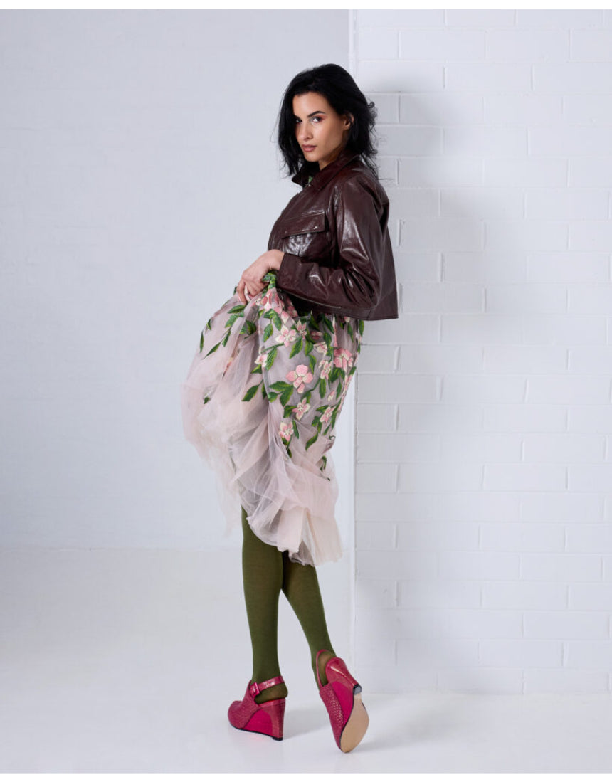 Olive green Luxe Merino Wool Tights by Tightology, close-up of soft, snug-fitting wool tights laid flat showing texture and color.