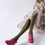 Olive green Luxe Merino Wool Tights by Tightology displayed on a model, showcasing their snug fit and soft wool texture.