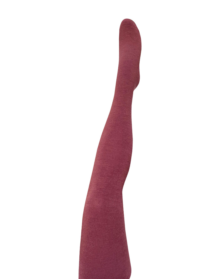 Close-up of Tightology Luxe Merino Wool Tights in wine color, showing the soft, textured fabric and snug fit.