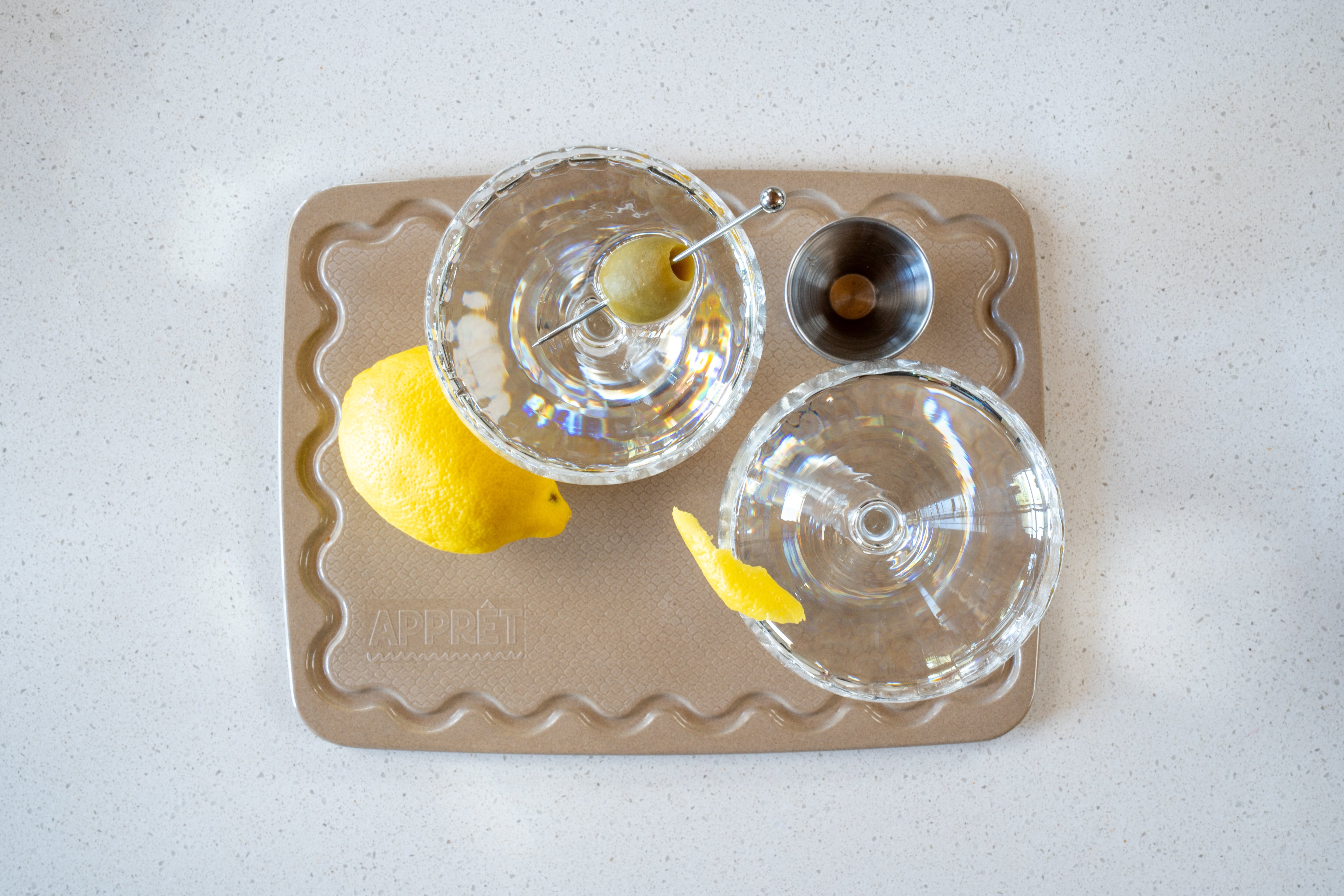Beige Maison Apprêt petite chopping board with smooth surface and rounded edges, ideal for kitchen food prep.