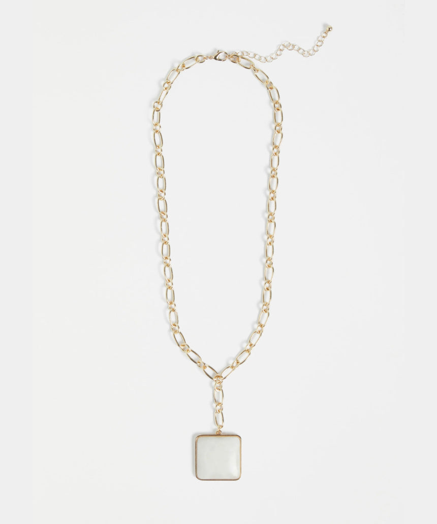 Elk Viri Gold Necklace featuring a delicate gold chain with a minimalist pendant, showcased against a neutral background.