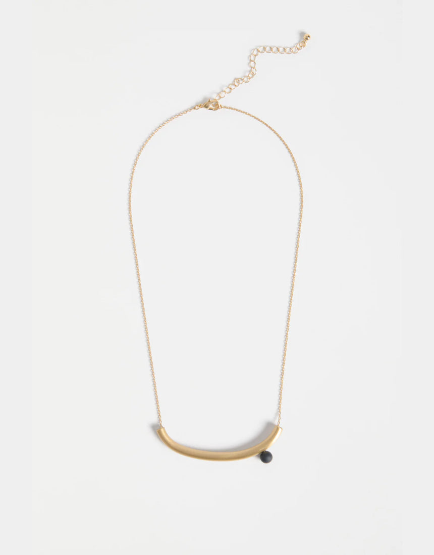 Gold Elk Ahas Necklace featuring a delicate chain and intricate pendant design, showcasing elegant jewelry craftsmanship.