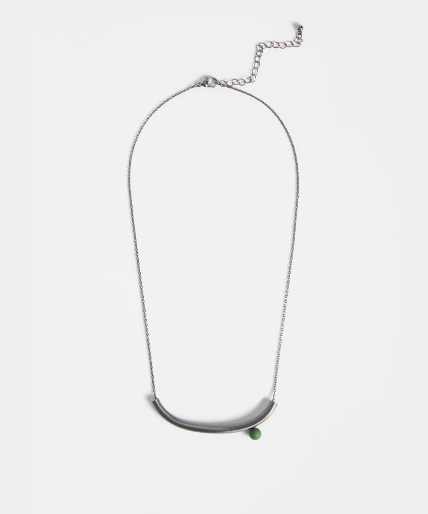 Elk Ahas necklace in gunmetal, featuring a sleek, modern pendant with a polished finish on a matching chain.