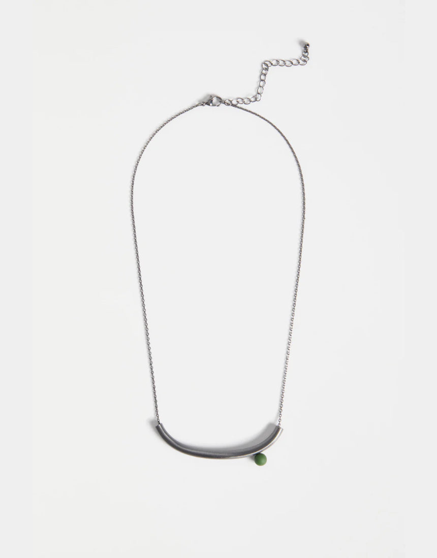 Elk Ahas necklace in gunmetal, featuring a sleek, modern pendant with a polished finish on a matching chain.