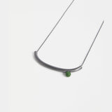 Elk Ahas necklace in gunmetal, featuring a sleek, modern design with a smooth chain and minimalist pendant.