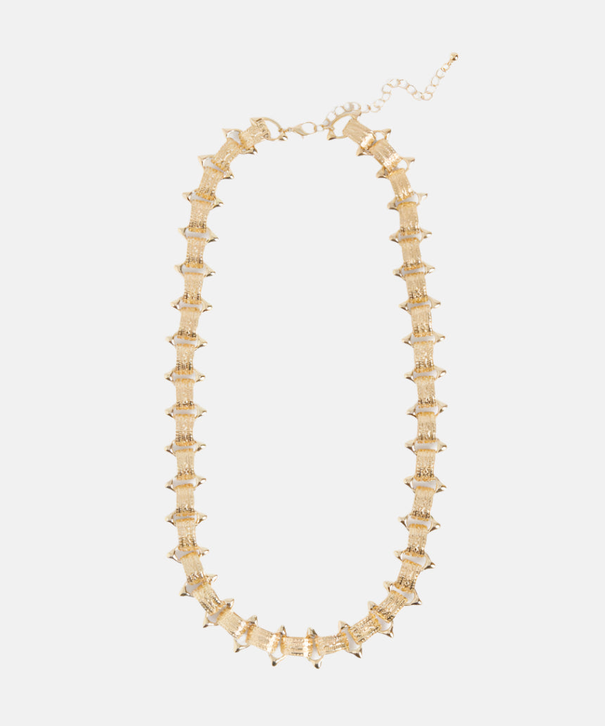 Elk Hvass gold necklace featuring a delicate chain and minimalist pendant, stylish jewelry for everyday wear.
