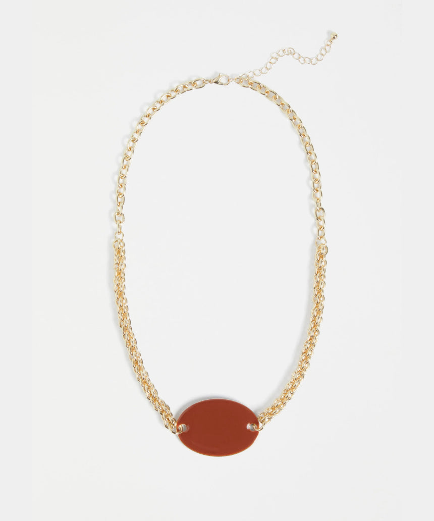 Elk Innfellt necklace with spice-themed pendant, featuring intricate design and vibrant colors, stylish jewelry accessory.