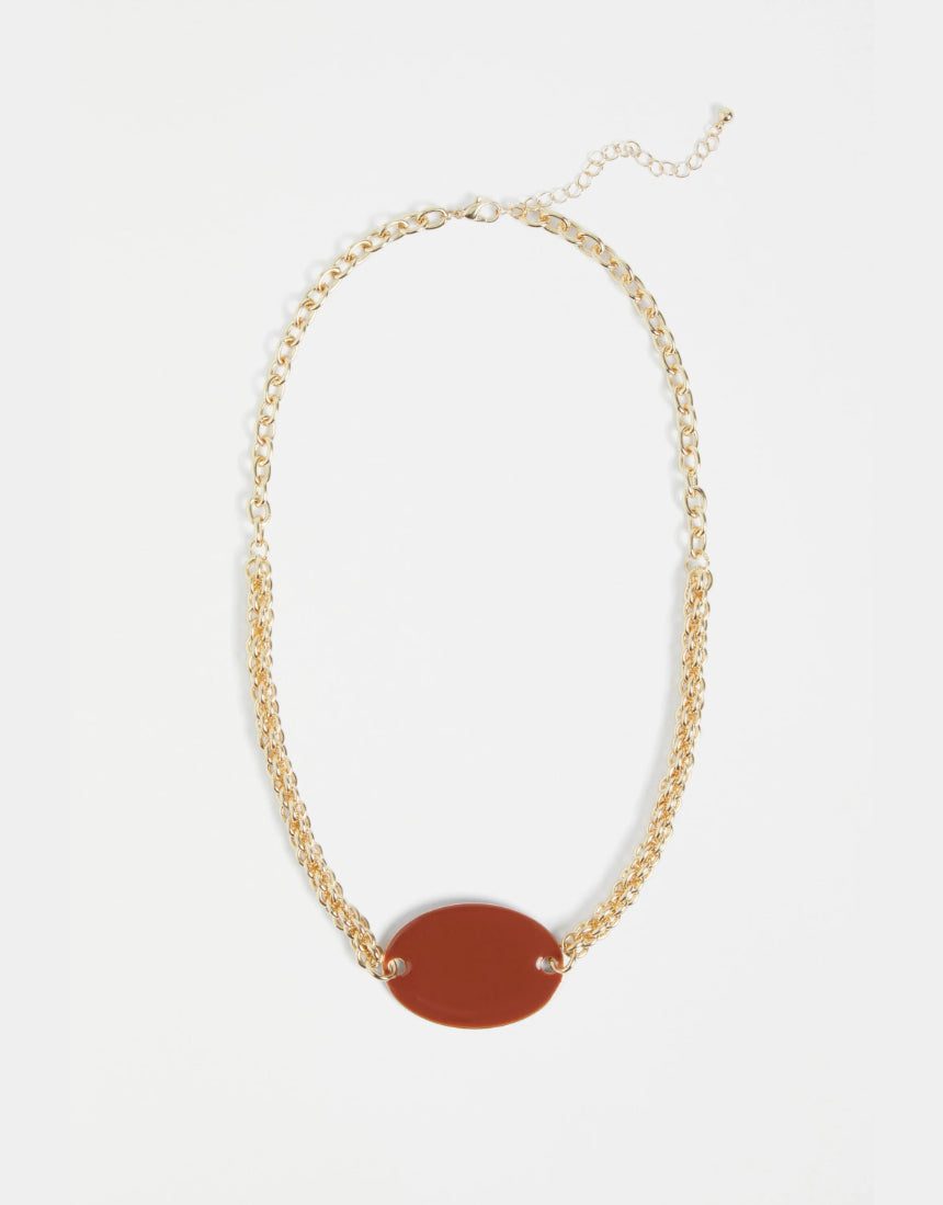Elk Innfellt necklace with spice-themed pendant, featuring intricate design and vibrant colors, stylish jewelry accessory.