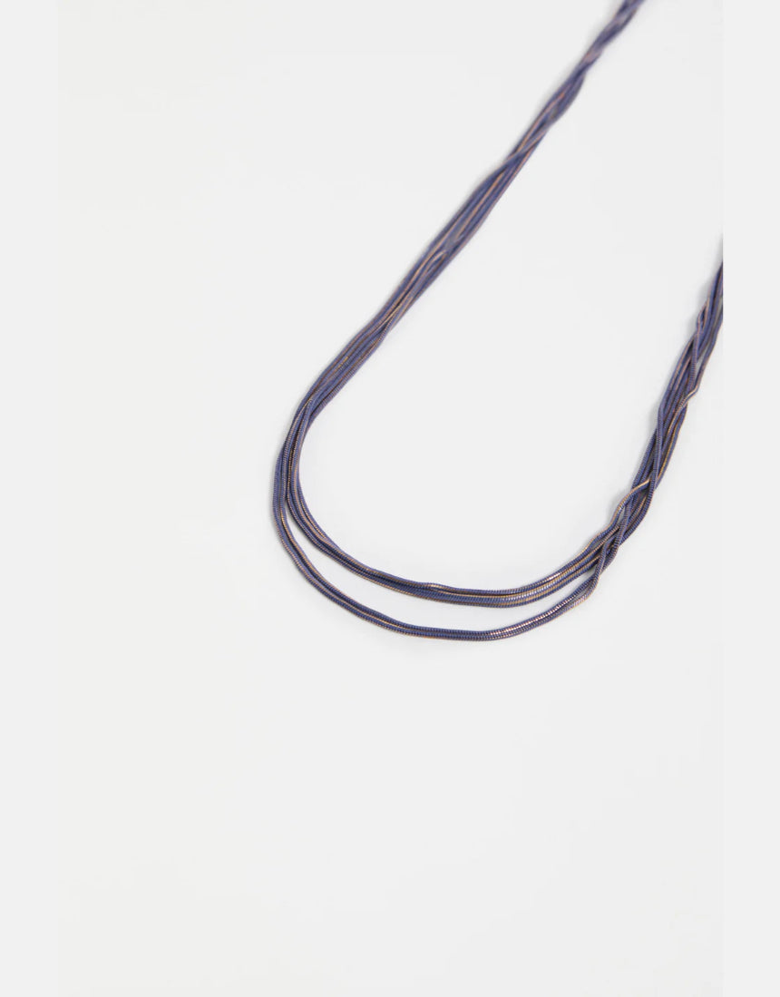 Elk Lina Necklace in cobalt blue featuring a sleek, modern design with a silver chain and minimalist pendant.