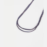 Elk Lina Necklace in cobalt blue featuring a sleek, modern design with a silver chain and minimalist pendant.